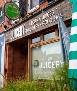 Exterior of The Juicery’s Newburyport location with branded signage and street-level storefront.